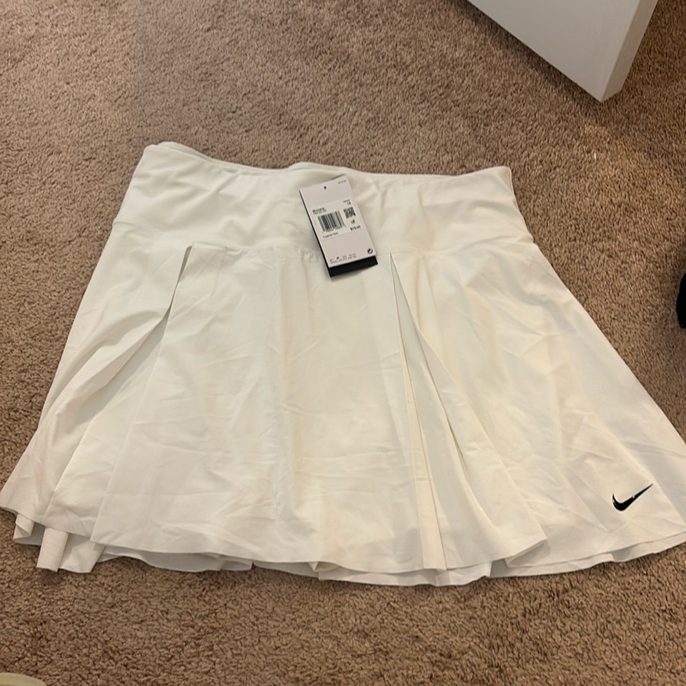 New with tags, plus Nike tennis skirt